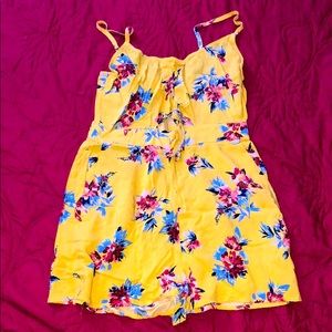 Yellow with flower print romper